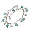 Aqua sea glass from Hawaii is combined with AAA Grade Pearls for a beautiful sea glass bracelet with sea turtle charm.