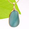 Beautiful stunning and LARGE sea glass piece from Seaham England set in a rolled gold setting.