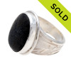 A stunning piece of black sea glass from Seaham England and the site of Victorian era glass factories is set in a solid sterling silver and fine silver bezel set ring.
SOLD - Sorry This Sea Glass Ring Is NO LONGER AVAILABLE!