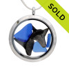 Genuine blue sea glass pieces combined with a real sharks teeth in this JUMBO 35MM stainless steel locket.
Sorry this sea glass selection has been sold!