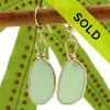 Natural Genuine longer seafoam green sea glass earrings in a 14K Rolled Gold Original Wire Bezel setting.
Sorry these sea glass earrings have been sold!