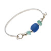 Tropical aqua sea glass from Hawaii and a vivid blue recycled glass bead set with sterling details on a solid sterling flat bangle bracelet.