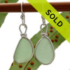 Perfect pieces of all natural genuine sea glass in a bright seafoam green and set in our original Wire Bezel© Sea Glass Earring Setting. 
Sorry this sea glass jewelry item has been sold!