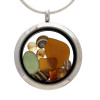 Vivid Peridot Green and amber sea glass combined a tiny beach shells and genuine citrine gems. Beach sand completes your own personal beach on the go. It is brightened up with a ton of peridot gems in a stainless steel screw top locket. 
Citrine is the Birthstone for November