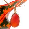 This is a P-E-R-F-E-C-T Orange Ultra Rare sea glass pendant (from Seaham England) in our Original Wire Bezel© setting in 14K Rolled Gold.