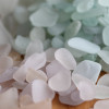 Many "white" sea glass pieces have a hint of another color. Pure white is a bit rarer.