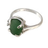 Natural surf tumbled seaweed green sea glass in a simple sterling basket ring.