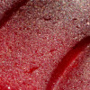 Detail of ridged red sea glass