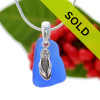 Beach found cobalt blue sea glass is combined with a solid sterling bail and finished with a S/S detailed Flip Flop Charm on an 18 Inch solid sterling snake chain.
Sorry this sea glass necklace has sold!