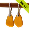 Bright Amber sea glass pieces shaped only by the sea, sand and time are suspended on solid sterling leverback earrings.
Sorry these Sea Glass Earrings are no longer available.