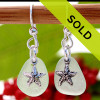 A TOP quality pair of Seafoam Green Genuine Certified Sea Glass earrings With Starfish Charms
Sorry this pair has been sold!