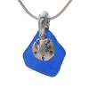 A piece of genuine blue sea glass on a necklace