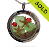 Green sea glass and vivid red gemstones make this a great locket necklace for the holidays.
Sorry this Sea Glass Locket Necklace has been SOLD!