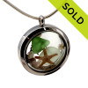 Genuine green and seafoam green sea glass pieces combined with a real starfish, pearls and real beach sand in this 30MM stainless steel locket.
Sorry this Sea Glass Jewelry item has been SOLD!