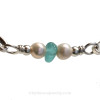 A detail of the sea glass bangle shows you the quality of the pearls and natural beach found sea glass.