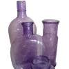 Lavender or purple glass starts as white glass bottles and jars. Over time it changes anywhere from a pale to deep purple.