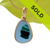 This is a stunning piece of longer mixed blue and green EndODay sea glass set in our Original Wire Bezel© pendant setting in gold. Classic and timeless.
Sorry this sea glass jewelry selection has been sold!