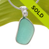 A large bright vivid aqua green in this very old English Sea Glass piece and set in our Original Wire Bezel© necklace pendant setting.
Sorry this sea glass jewelry piece has been sold!