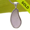 A PERFECT piece of lavender or purple sea glass from Maine set in our Solid Sterling Silver Deluxe Wire Bezel pendant setting.
SOLD - Sorry this Rare Sea Glass Pendant is NO LONGER AVAILABLE!