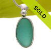 A large bright vivid aqua green in this very old English Sea Glass piece and set in our Original Wire Bezel© necklace pendant setting.
Sorry this one of a kind sea glass jewelry piece has been SOLD!