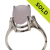 An unaltered lavender or purple sea glass piece set in a simple sterling silver basket ring.
SOLD - Sorry this Sea Glass Ring is NO LONGER AVAILABLE!