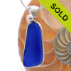 A nice large frosty piece of Vivid Blue Genuine Sea Glass with in our signature Deluxe Wire Bezel© pendant setting that leaves both front and back open and the glass unaltered from the way it was found on the beach.
Sorry this Sea Glass Jewelry piece is no longer available.