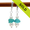 Beautiful aqua sea glass is combined with fresh water pearls on solid sterling leverback earrings.. Elegant and simple sea glass earrings.
Sorry this sea glass jewelry selection is no longer available.