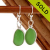 Genuine beach found Bright Mermaids Emerald Green Sea Glass Earrings in a Solid Sterling Silver Original Wire Bezel© setting.
Sorry this Sea Glass Jewelry selection has been SOLD