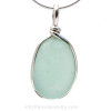 A beautiful piece of 100 year old sea glass set in a classic elegant setting.