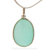 A beautiful piece of 100 year old sea glass set in a classic elegant setting.