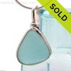 A lovely piece of beach found glass from Seaham England in a stunning aqua blue is set in our Original Wire Bezel© pendant setting.
SOLD - Sorry This Sea Glass Jewelry Selection Is NO LONGER AVAILABLE!