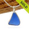 A simple lieghtweight piece of Cobalt Blue Genuine Sea Glass with in our signature Original Wire Bezel© pendant setting.
Sorry this piece of sea glass jewelry has been sold!