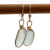A classic and timeless sea glass earrings setting in gold.