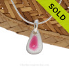 A petite piece of flashed pink sea glass is combined on a solid sterling cast bail and presented on an 18 Inch solid sterling snake necklace chain.
Sorry this Sea Glass Necklace has been sold!