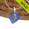 A smaller piece of Cobalt Blue Certified Genuine Sea Glass in a Sterling Necklace with a Sea Turtle Charm.
Sorry this piece of Sea Glass Jewelry has been sold!