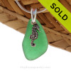 Vivid Green sea glass set on a solid sterling cast bail with a sterling silver seahorse charm.
Sorry this Sea Glass Necklace has been SOLD!