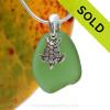 Larger Green sea glass set on a solid sterling cast bail with a sterling silver turtle charm. 
Sorry this Sea Glass Necklace is NO LONGER AVAILABLE!