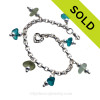 3 pieces of Seafoam Green genuine beach found sea glass combined with vivid bright aqua glass beads in a totally solid sterling silver bracelet.
SOLD - Sorry this Sea Glass Charm Bracelet is NO LONGER AVAILABLE!