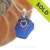 A nice but not perfect piece of blue genuine sea glass with a solid sterling bail and detailed heart charm. This piece comes complete with our sterling 1MM snake chain.
SOLD - Sorry this Rare Sea Glass Necklace is NO LONGER AVAILABLE!