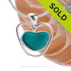 A beautiful small natural sea glass heart set in our deluxe wire bezel pendant setting! 
Genuine sea glass hearts are a RARE phenomena and cherished among sea glass lovers!
Sorry this one of a kind Sea Glass Necklace has been SOLD!
