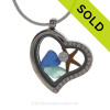 Our new heart lockets make this aqua and blue sea glass really shine! Tiny crystals on the rim for some added bling.
CZ crystal and a small starfish make this a great beachy gift!