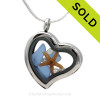 Carolina Blue Beach Found Sea Glass combined a silver heart locket necklace with Fresh Water Pearls and a a baby starfish.