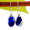 Super Ultra Mixed Cobalt Blue sea glass pieces from Seaham England are set in our Original Wire Bezel© earring setting. This is a very hard sea glass to match as the color is cross sectioned from one side to the other.
