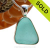 A wonderful PERFECT and THICK piece of Vivid Aqua Genuine Sea Glass in our In Our Deluxe Sterling Wire Bezel© Necklace Pendant.
SOLD - Sorry this Rare Sea Glass Pendant is NO LONGER AVAILABLE!!!!