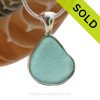 A smaller piece of Vivid Aqua Blue Genuine Sea Glass in our In Our Deluxe Sterling Wire Bezel© Necklace Pendant.
SOLD - Sorry this Rare Sea Glass Pendant is NO LONGER AVAILABLE!