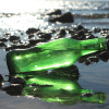 Green sea glass is common and is the result of beer and soda bottles being discarded into the sea.