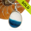 This is a LARGE Ultra Rare Seaham mixed Electric Cyan Blue sea glass in an aqua base multi color pendant is set in our Deluxe Wire Bezel© pendant setting.
SOLD - Sorry this Ultra Rare Sea Glass Pendant is NO LONGER AVAILABLE!