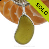 A LARGE piece of natural Peridot Green Genuine Sea glass in my Original Sterling Silver Wire Bezel© a simple design that lets all the beauty of this glass shine.
