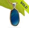 This amazing Blue multi sea glass piece is versatile in a mixed metal Deluxe Wire Bezel© pendant setting.
SOLD - Sorry this Ultra Rare Sea Glass Pendant is NO LONGER AVAILABLE!!