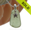 Well Aged Peridot Green sea glass set on a solid sterling cast bail with a sterling silver Starfish charm.
SOLD - Sorry this  Rare Sea Glass Necklace is NO LONGER AVAILABLE!